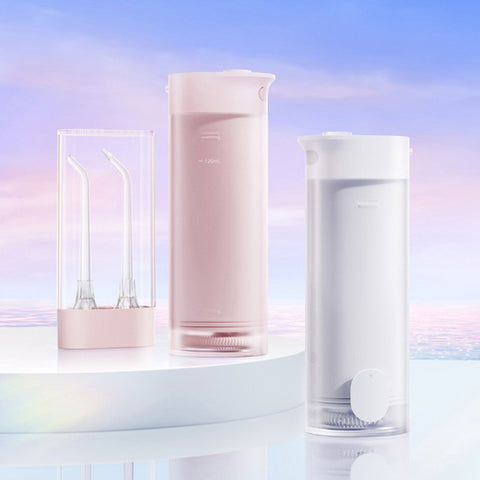小米米家便携式冲牙器家用充电式洗牙器出行便携式洁牙器附正畸喷嘴可全身水洗120mL便携式冲牙器，净力不输家用冲牙器，象牙白、樱花粉2色可选