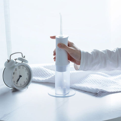 小米米家电动冲牙器家用便携式牙缝水牙线口腔清洁牙结石喷牙洗牙器+米家电动牙刷T100高频脉冲水流 / 独特稳压系统 / 四挡模式 / 200mL大容量水箱